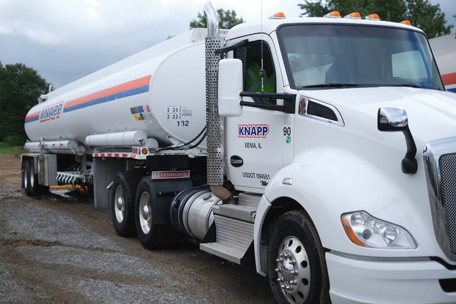 Knapp oil fuel truck next to large fuel container in Xenia, Illinois