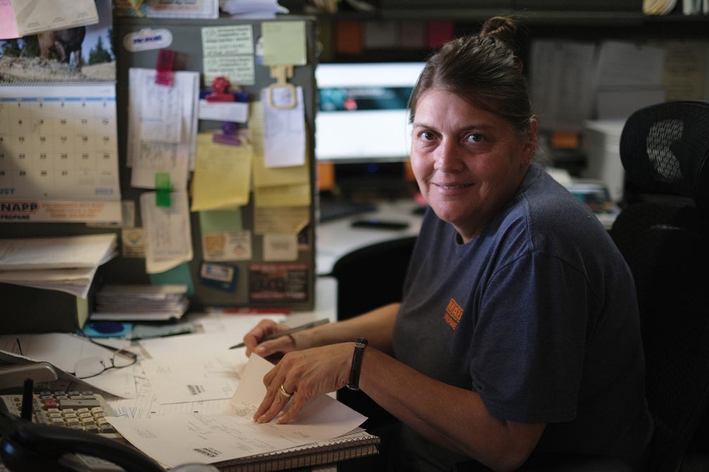 Office worker at her desk at the Pinckneyville, Illinois Knapp location