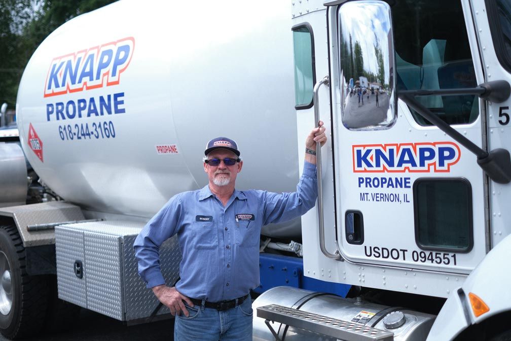 Knapp propane driver standing next to propane truck at the Mt. Vernon, Illinois location